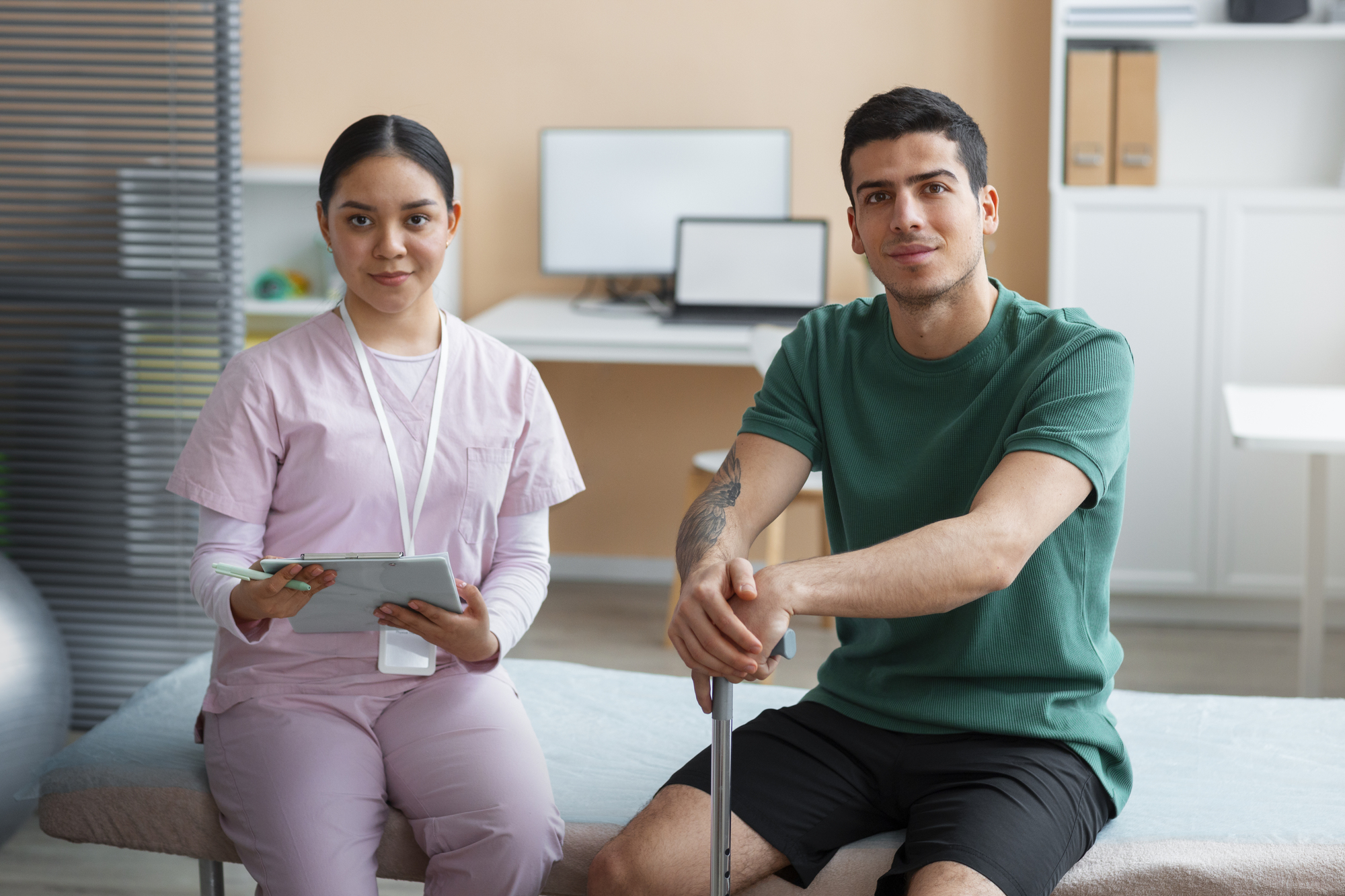 Medical Assistant Helping Patient With Physiotherapy Exercises at Core Concept